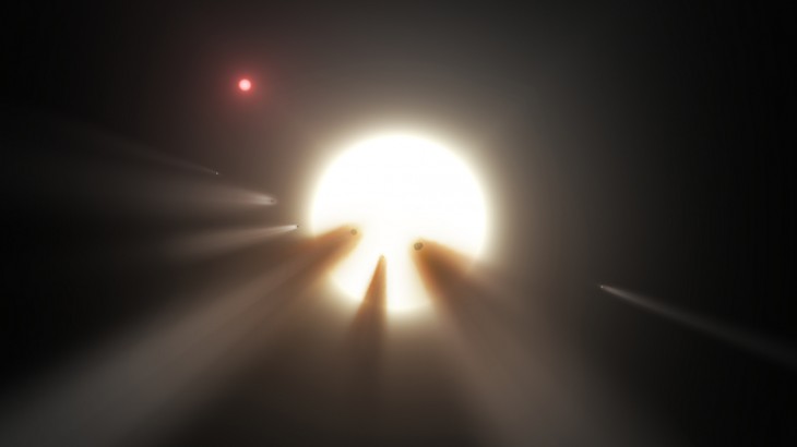 Artystyczna wizja komet przelatujących na tle gwiazdy.